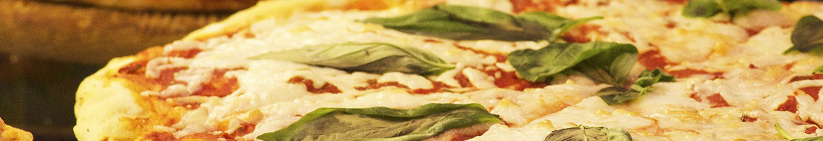 Eating Italian Pizza Sandwich at Pacileo's Apizza & Pasta restaurant in Branford, CT.